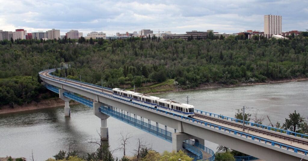 Light Rail Transit (LRT) crossing a bridge over the Saskatchewan River in Edmonton, Alberta.
