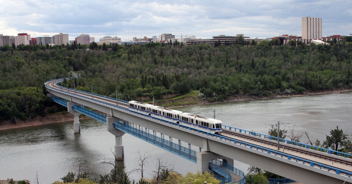 Light Rail Transit (LRT) crossing a bridge over the Saskatchewan River in Edmonton, Alberta.