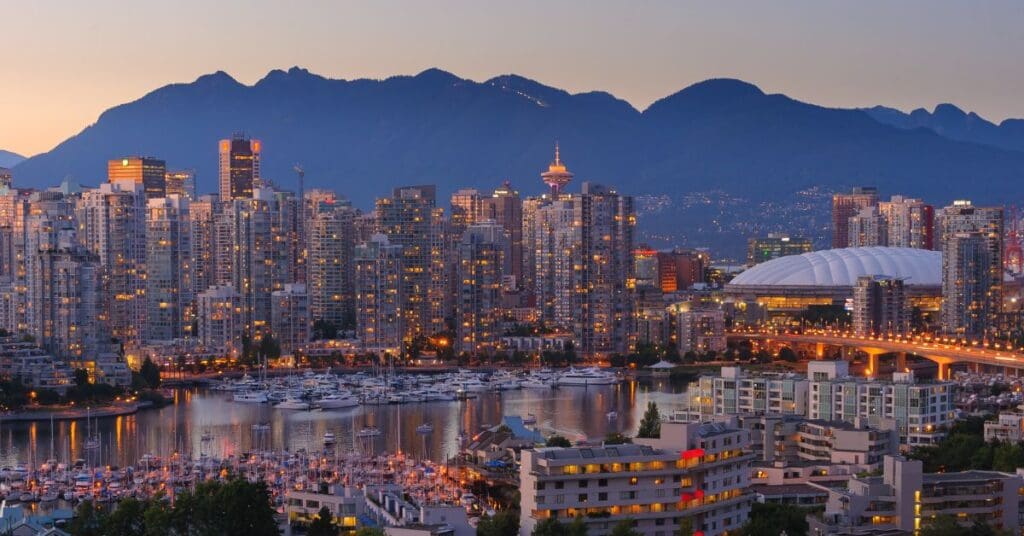 Scenic view of Vancouver with mountains in the background, highlighting the beauty of living in Vancouver, BC, Canada.