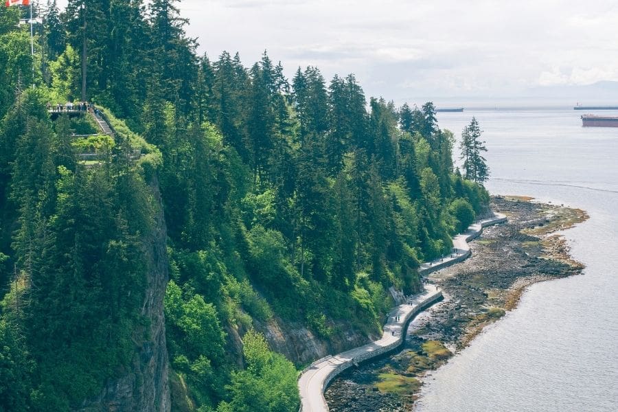 Scenic view of Stanley Park in Vancouver, BC, showcasing trails, greenery, and waterfront, illustrating outdoor life for those living in Vancouver.