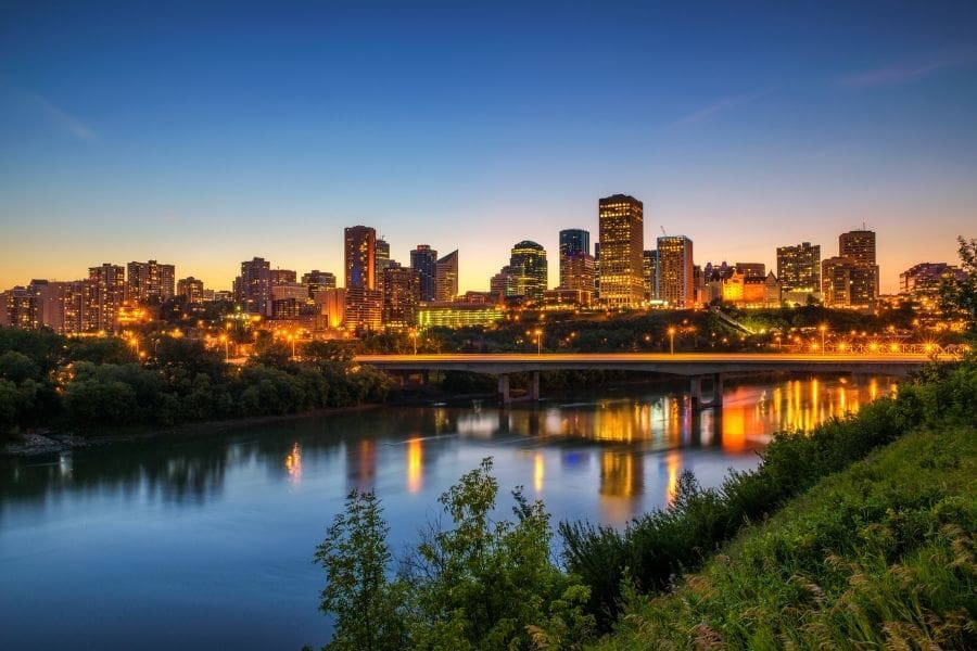 Edmonton Downtown skyline and the  Saskatchewan River at night.
