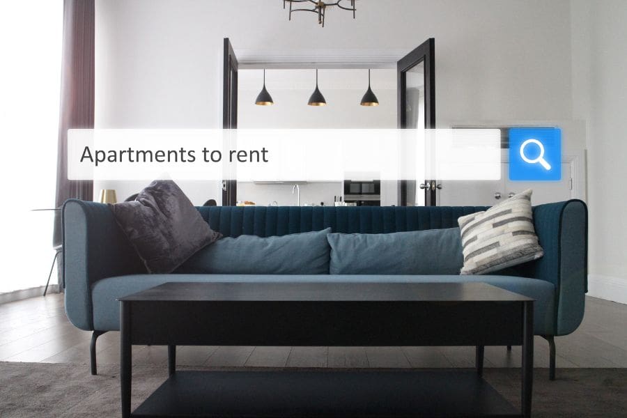 A search bar that reads "Apartments to rent" is superimposed on the interior of a living room with a sofa. Landlords will conduct a credit check when newcomers are searching for a rental. 