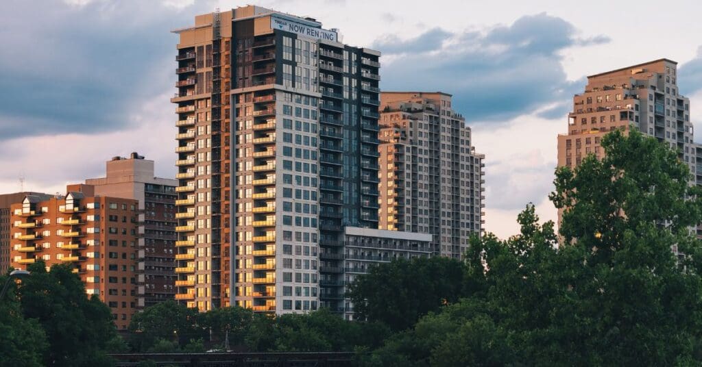 Modern high-rise residential apartment buildings in a Canadian city for newcomers looking to rent in Canada without a credit history
