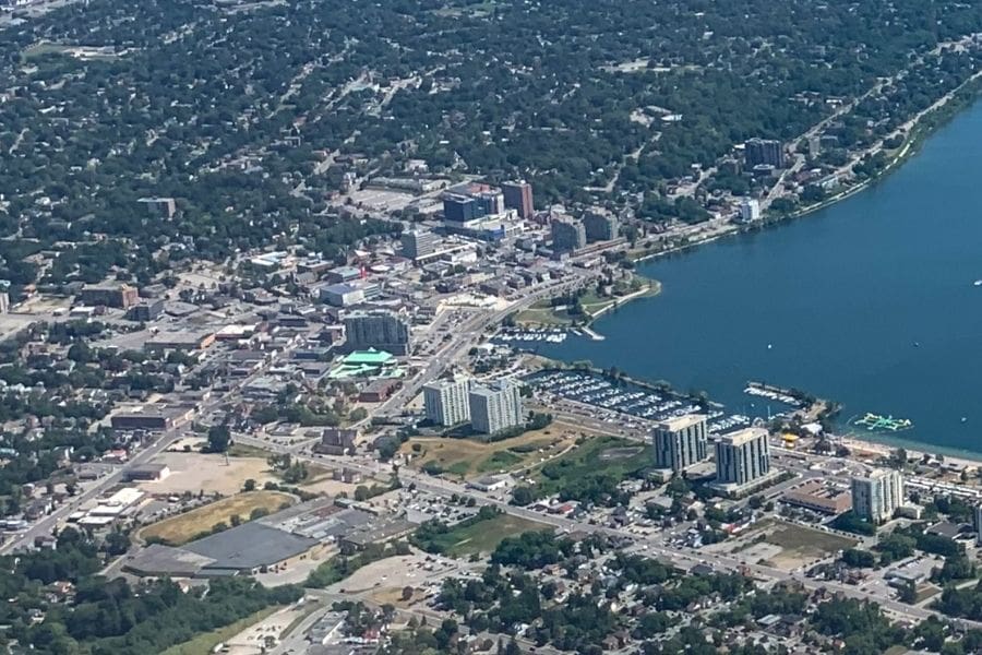 Aerial view of Kempenfelt Bay, City marina, waterfront parks, and urban layout. 