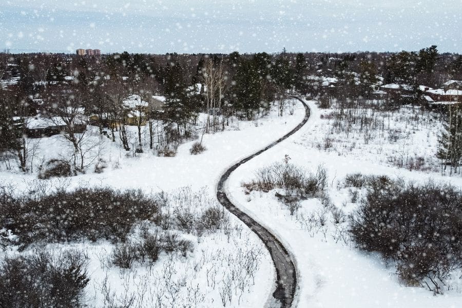 An aerial view of a footpath in the Kanata neighbourhood in winter. 