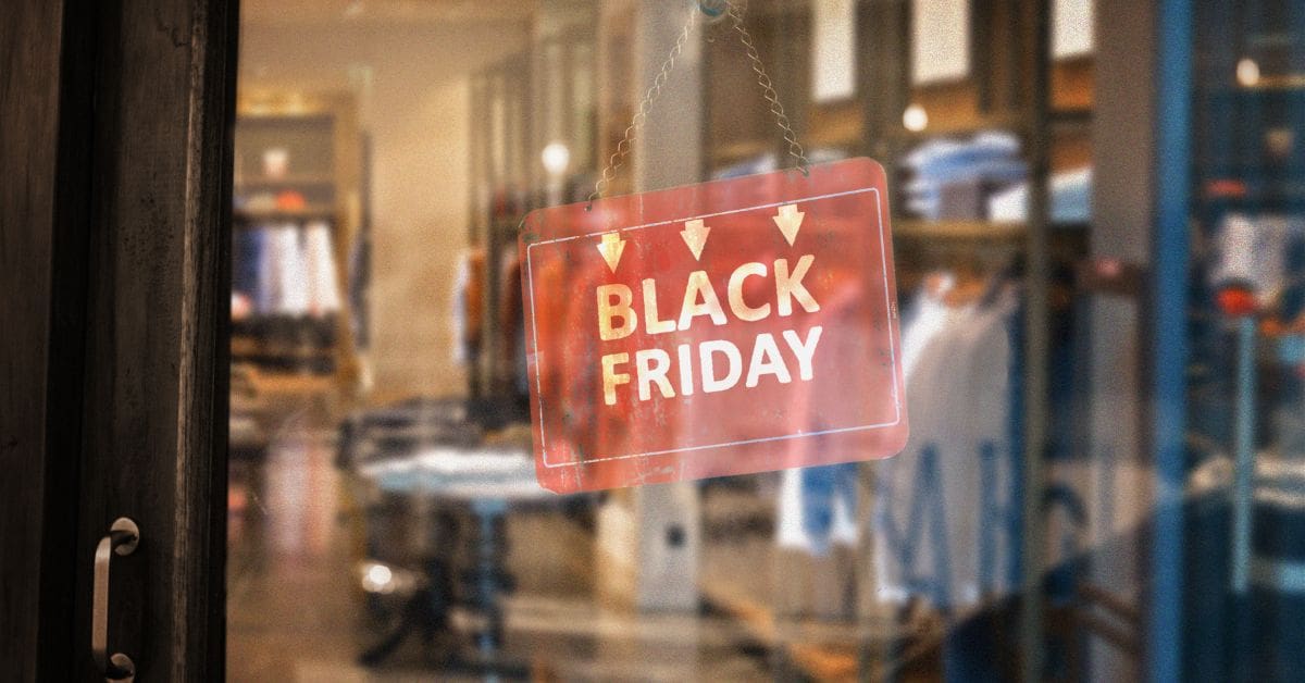 Black Friday sale sign hanging at the entrance of a retail store in Canada.