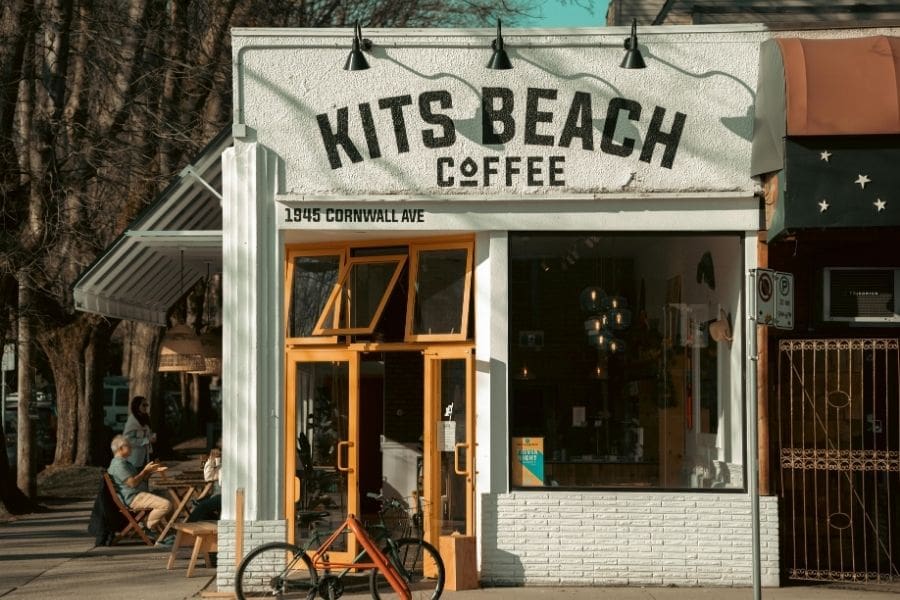 Exterior view of Kits Beach Coffee shop and outdoor seating on Cornwall Avenue in Kitsilano.