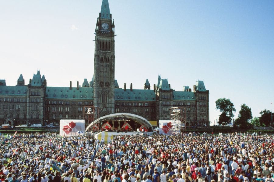 A large crowd is gathered on Parliament Hill for  Canada Day celebrations on July 1.