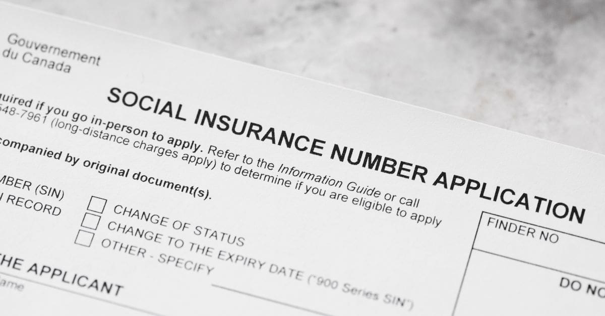 A close-up shot of the official Government of Canada Social Insurance Number Application form, highlighting sections for in-person requirements and temporary resident 900 series SIN numbers.