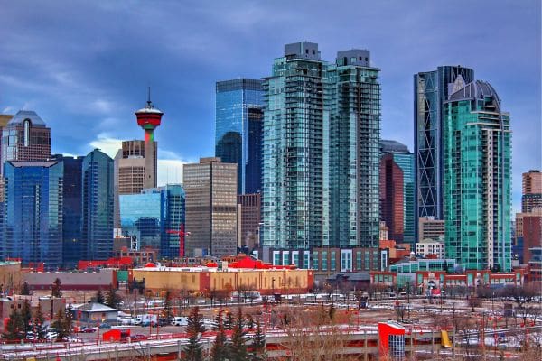 The dense corporate office towers and skyscrapers of downtown Calgary, showcasing the city's business district. An ideal representation of jobs in Calgary and career opportunities.