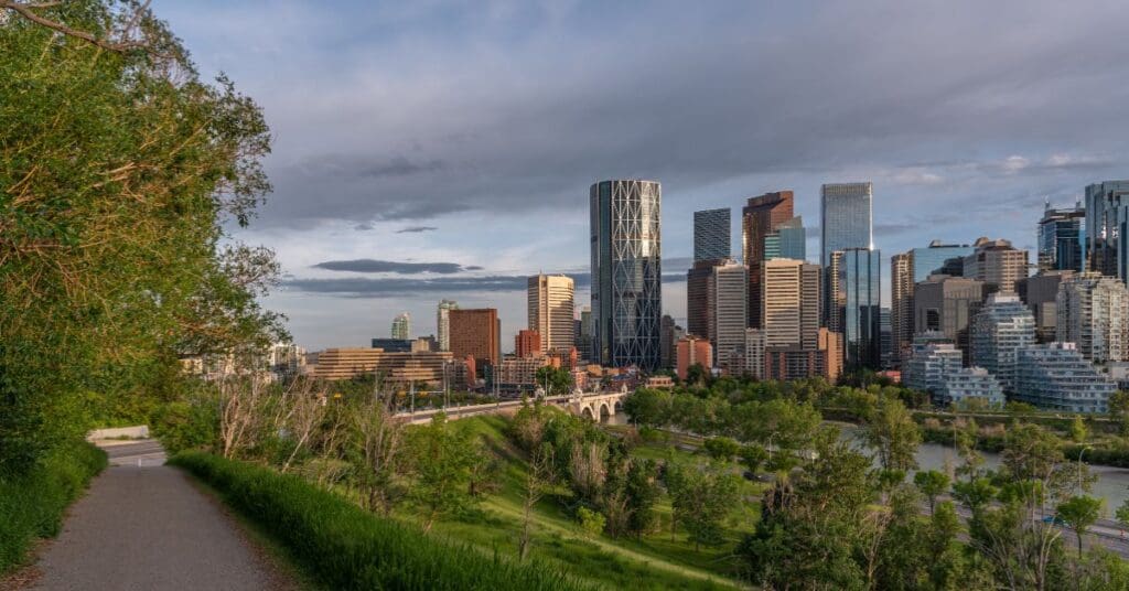 Downtown Calgary skyline and paved pathway network for public transit commuters.