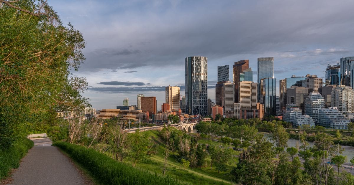 Downtown Calgary skyline and paved pathway network for public transit commuters.