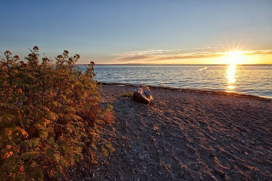 Scenic sunset over Boundary Bay at Crescent Beach in South Surrey, BC.