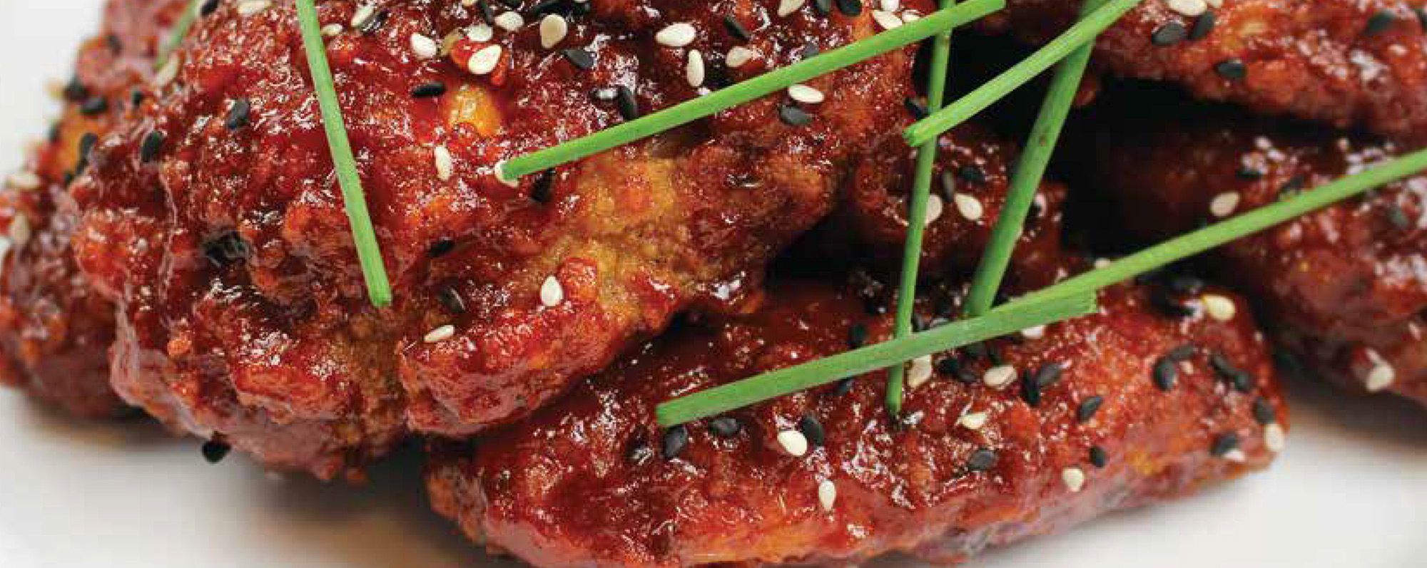 Ailes de poulet saupoudrées au barbecue Gochujang à  la coréenne